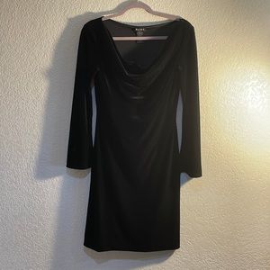 Sleek black midi dress cut from stretch velvet.